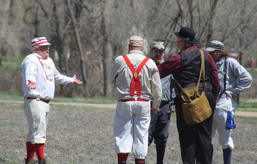 This is an 1860s- style “rhubarb,” minus replay. The discussion was whether a ball went fair or foul. The arbiter ruled that the two captains agreed the runner, “Soda Boots” (second from right) was out.